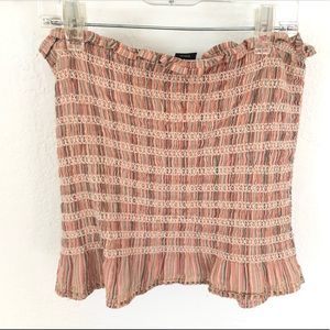 Guess tube top. size meduim can also fit a small